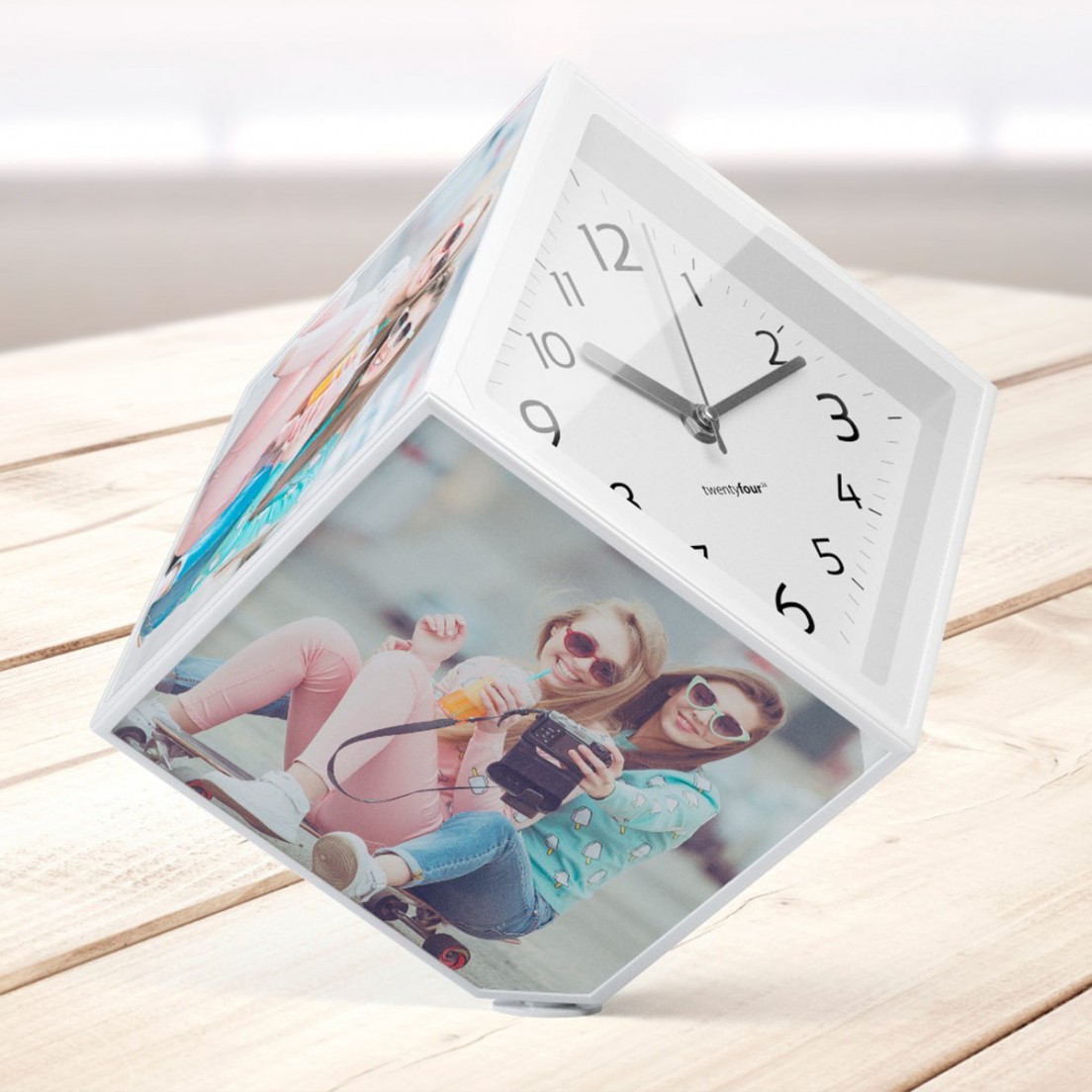 Cubo portafoto rotante con orologio